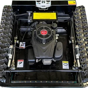 Top-down view of a black remote-controlled tracked lawn mower, showcasing its Loncin 224cc gasoline engine, hydraulic actuators, and safety warning labels.