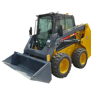 Front side view of a yellow wheeled skid steer loader with enclosed cab and black bucket attachment, on a plain white background.