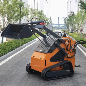 Side-front view of orange walk-behind tracked skid steer loader with raised bucket and rugged tracks