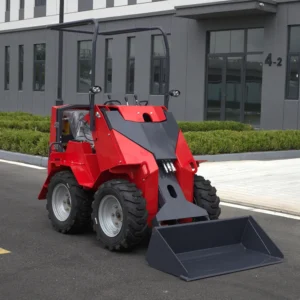 Side-front view of red mini skid steer loader with level bucket, rugged tires and open canopy