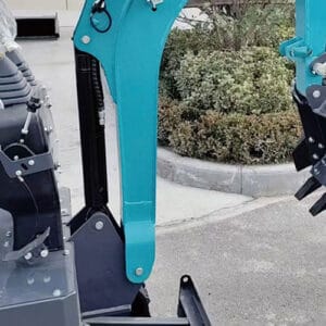Close-up of teal mini excavator boom arm and pivot linkage with hydraulic components