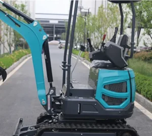 Side view of teal mini excavator operator cab with joysticks, canopy and rubber tracks