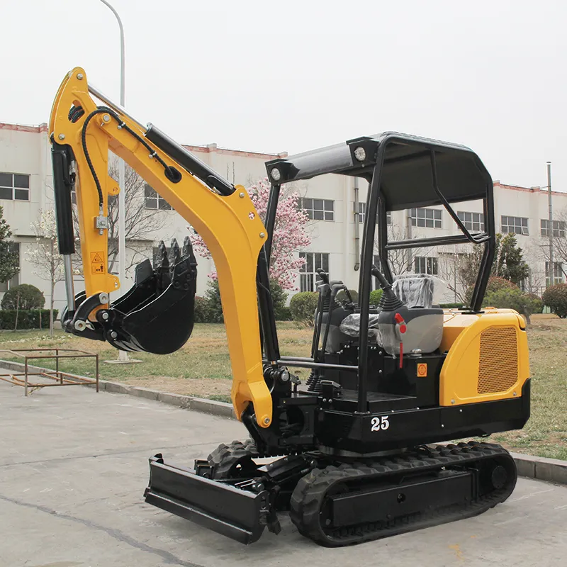 Yellow Model 25 compact mini crawler excavator with canopy, displayed outside factory for landscaping and small earthmoving jobs